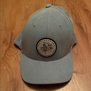 TravisMathew light blue golf hat
